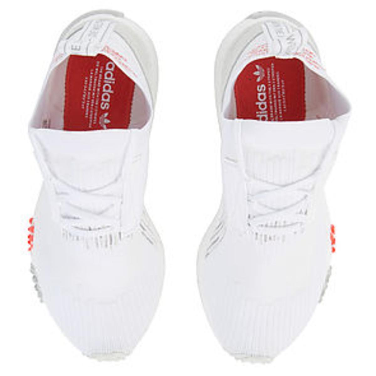 The Women's NMD Racer Primeknit in White and Trace Scarlet